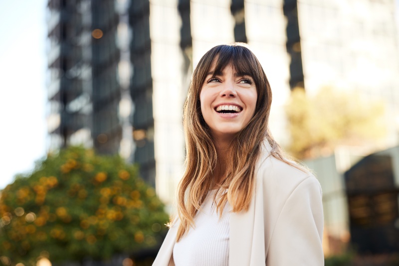 A young woman got cosmetic dental bonding to adjust the shape of her teeth in Moberly, MO